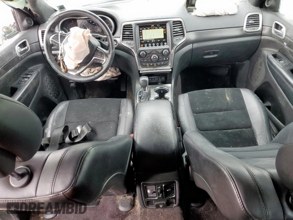 2018 Jeep Grand Cherokee Altitude with VIN 1C4RJFAG0JC250082, listed as a Copart auction lot 55940135 with 79,523 mi miles and Salvage title. Bid and sale history available at DreamBid. Image 8.