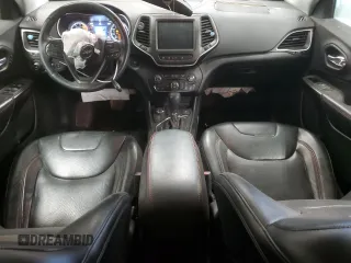 2019 Jeep Cherokee Trailhawk Elite с VIN 1C4PJMBN6KD162156, выставлен на аукционе Copart как лот 83041704 с пробегом 100 616 миль миль и Списание • Salvage title. История ставок и продаж доступна на DreamBid. Изображение 8.