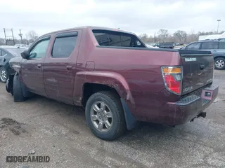 2007 Honda Ridgeline RTX with VIN 2HJYK16367H503022, listed as a IAAI auction lot 41526153 with 141,879 mi miles. Bid and sale history available at carsss.com. Image 3.