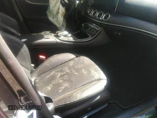 2018 Mercedes-Benz E 300 with VIN WDDZF4KB6JA398246, listed as a IAAI auction lot 40830920 with 64,504 mi miles and . Bid and sale history available at DreamBid. Image 5.