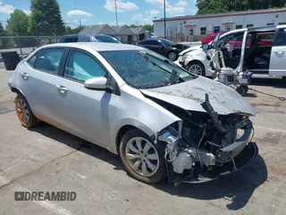 2014 Toyota Corolla L z VIN 2T1BURHE6EC201402, wystawiony jako IAAI lot #42350827 z przebiegiem 100 704 mil mil oraz . Historia ofert i sprzedaży dostępna na DreamBid. Obrazek 1.