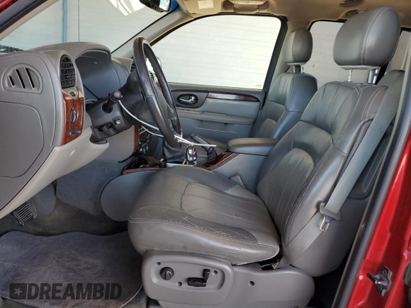 2004 GMC Envoy SLT with VIN 1GKET16S646144154, listed as a Copart auction lot 54154855 with 168,190 mi miles and Clean Title. Bid and sale history available at DreamBid. Image 7.