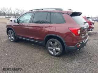 2019 Honda Passport Touring with VIN 5FNYF8H99KB005625, listed as a IAAI auction lot 41905030 with 64,998 mi miles. Bid and sale history available at carsss.com. Image 3.