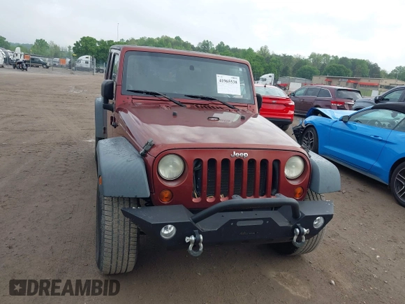 2008 Jeep Wrangler Unlimited X with VIN 1J4GA39108L606685, listed as a IAAI auction lot 41965538 with 288,946 mi miles. Bid and sale history available at carsss.com. Image 12.