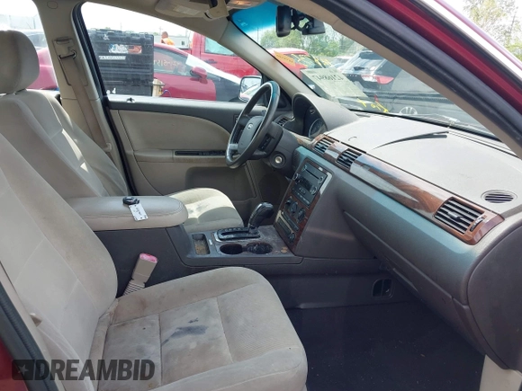 2008 Ford Taurus SEL with VIN 1FAHP24W88G149063, listed as a IAAI auction lot 42168947 with 128,735 mi miles and . Bid and sale history available at DreamBid. Image 5.