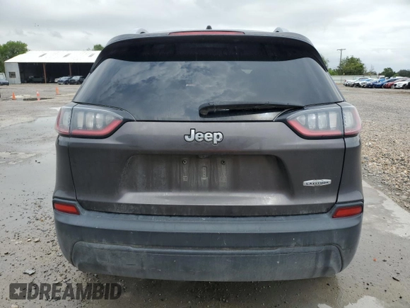 2019 Jeep Cherokee Latitude Plus с VIN 1C4PJLLB9KD186823, выставлен на аукционе Copart как лот 56421145 с пробегом 175 542 миль миль и Списание • Salvage title. История ставок и продаж доступна на DreamBid. Изображение 6.