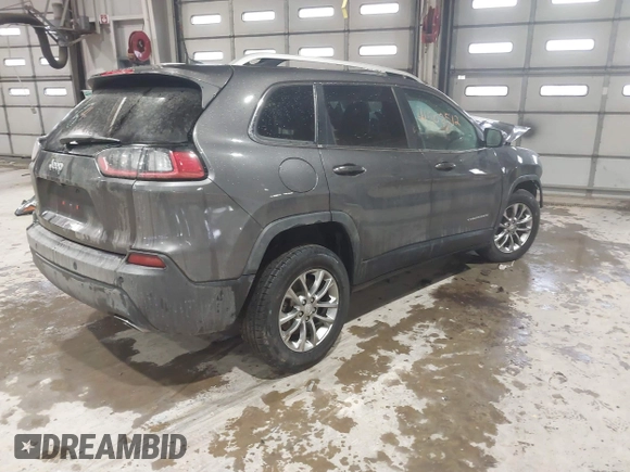 2020 Jeep Cherokee Latitude Plus with VIN 1C4PJMLX5LD642190, listed as a IAAI auction lot 41502512 with 1,600,800 mi miles. Bid and sale history available at carsss.com. Image 4.