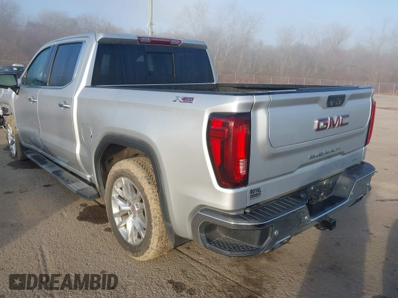 2021 GMC Sierra 1500 SLT z VIN 3GTU9DED7MG250461, wystawiony jako IAAI lot #41460881 z przebiegiem 89 344 mil mil oraz . Historia ofert i sprzedaży dostępna na DreamBid. Obrazek 3.
