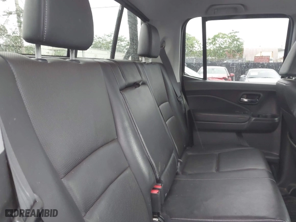 2017 Honda Ridgeline RTL-E with VIN 5FPYK3F76HB034774, listed as a IAAI auction lot 41754824 with 67,451 mi miles. Bid and sale history available at carsss.com. Image 8.