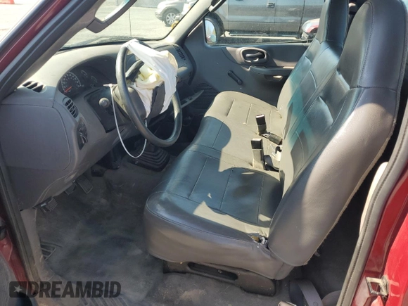 2003 Ford F-150 XL with VIN 1FTRF17293NA33833, listed as a Copart auction lot 54552965 with 70,016 mi miles and Salvage Title. Bid and sale history available at DreamBid. Image 7.