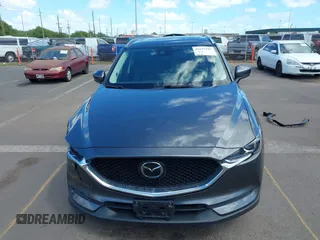 2021 Mazda CX-5 Touring with VIN JM3KFACM2M1348305, listed as a IAAI auction lot 41627199 with 30,044 mi miles. Bid and sale history available at carsss.com. Image 13.