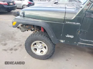 1998 Jeep Wrangler SE with VIN 1J4FY29P1WP760687, listed as a IAAI auction lot 41720889 with 210,592 mi miles. Bid and sale history available at carsss.com. Image 6.