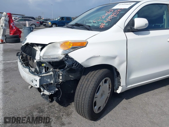 2010 Scion xD with VIN JTKKU4B48AJ053828, listed as a IAAI auction lot 41959804 with 255,337 mi miles. Bid and sale history available at carsss.com. Image 6.