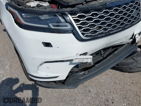 2020 Land Rover Range Rover Velar S z VIN SALYB2EX7LA252141, wystawiony jako IAAI lot #42131779 z przebiegiem 101 612 mil mil oraz . Historia ofert i sprzedaży dostępna na DreamBid. Obrazek 6.