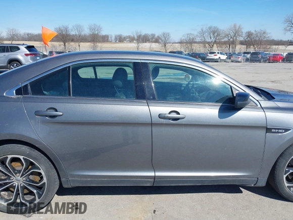 2013 Ford Taurus SHO с VIN 1FAHP2KT0DG220825, выставлен на аукционе IAAI как лот 41851095 с пробегом 163 797 миль миль и . История ставок и продаж доступна на DreamBid. Изображение 14.
