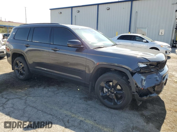 2023 Jeep Grand Cherokee Laredo with VIN 1C4RJKAG8P8751144, listed as a Copart auction lot 59958545 with 29,727 mi miles and Salvage title. Bid and sale history available at DreamBid. Image 4.