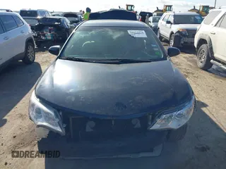 2012 Toyota Camry L with VIN 4T4BF1FKXCR212957, listed as a IAAI auction lot 41672878 with 245,407 mi miles. Bid and sale history available at carsss.com. Image 12.