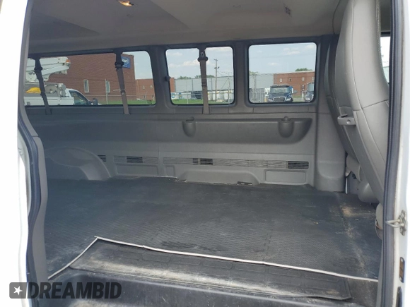 2018 Chevrolet Express Passenger LT with VIN 1GAZGPFPXJ1234733, listed as a Copart auction lot 59728105 with 92,513 mi miles and Salvage title. Bid and sale history available at DreamBid. Image 11.