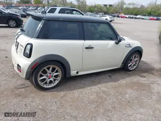 2008 MINI Cooper Hardtop S with VIN WMWMF73578TV33406, listed as a IAAI auction lot 42081596 with 120,183 mi miles. Bid and sale history available at carsss.com. Image 4.