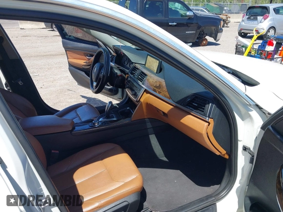 2013 BMW 3 Series 328i xDrive with VIN WBA3B5C51DJ599144, listed as a IAAI auction lot 42059260 with 84,153 mi miles. Bid and sale history available at carsss.com. Image 5.