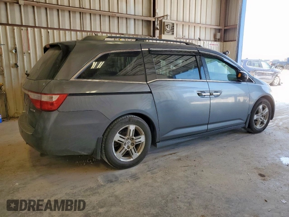 2012 Honda Odyssey Touring с VIN 5FNRL5H94CB049626, выставлен на аукционе Copart как лот 61191435 с пробегом 199 728 миль миль и Списание • Salvage title. История ставок и продаж доступна на DreamBid. Изображение 3.