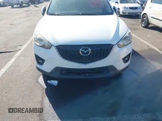 2014 Mazda CX-5 Grand Touring with VIN JM3KE4DY4E0375809, listed as a IAAI auction lot 41468078 with 151,226 mi miles. Bid and sale history available at carsss.com. Image 6.