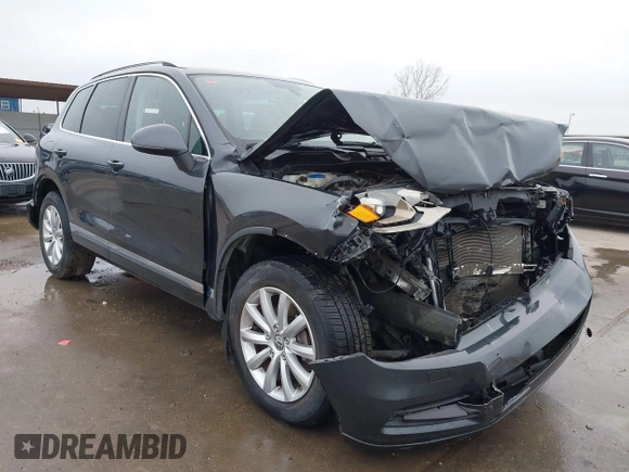 2012 Volkswagen Touareg Sport with VIN WVGEF9BP9CD008545, listed as a IAAI auction lot 41492653 with 138,424 mi miles and . Bid and sale history available at DreamBid. Image 1.