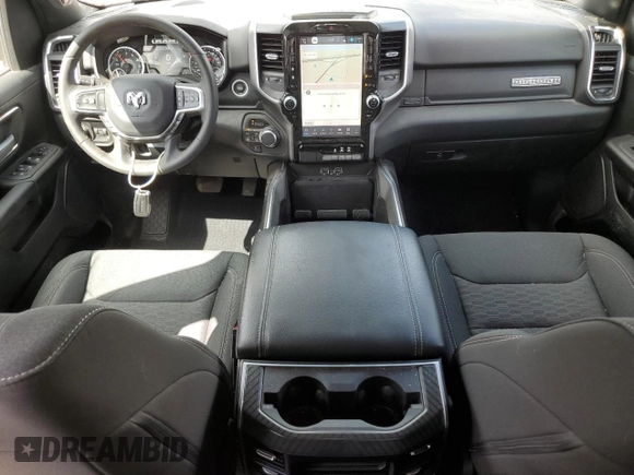 2025 Ram 1500 with VIN 1C6SRFBP5SN506206, listed as a Copart auction lot 55414155 with 5,892 mi miles and Salvage title. Bid and sale history available at DreamBid. Image 8.