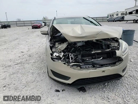 2016 Ford Focus SE z VIN 1FADP3F20GL267077, wystawiony jako Copart lot #53649665 z przebiegiem 106 329 mil mil oraz Szkoda całkowita • Salvage title. Historia ofert i sprzedaży dostępna na DreamBid. Obrazek 11.