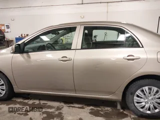 2010 Toyota Corolla with VIN 2T1BU4EE2AC369927, listed as a IAAI auction lot 41519760 with 135,639 mi miles. Bid and sale history available at carsss.com. Image 14.