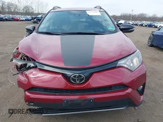 2018 Toyota RAV4 XLE with VIN 2T3RFREV4JW798868, listed as a IAAI auction lot 41751618 with 76,003 mi miles. Bid and sale history available at carsss.com. Image 12.