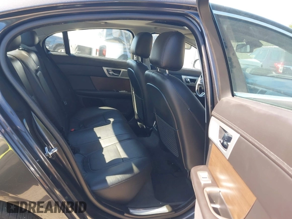 2014 Jaguar XF V6 SC with VIN SAJWJ0EF9E8U31032, listed as a IAAI auction lot 42046036 with 118,927 mi miles. Bid and sale history available at carsss.com. Image 8.