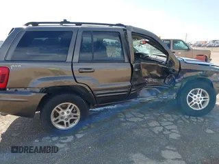 1999 Jeep Grand Cherokee Limited with VIN 1J4GW68N5XC773100, listed as a IAAI auction lot 41998432 with Not provided miles and . Bid and sale history available at DreamBid. Image 6.