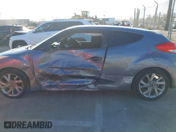 2016 Hyundai Veloster with VIN KMHTC6AD3GU283985, listed as a IAAI auction lot 41872103 with 153,949 mi miles. Bid and sale history available at carsss.com. Image 14.