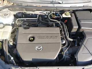 2007 Mazda 3 i Sport with VIN JM1BK12F371721573, listed as a IAAI auction lot 41776548 with 152,317 mi miles and . Bid and sale history available at carsss.com. Image 10.