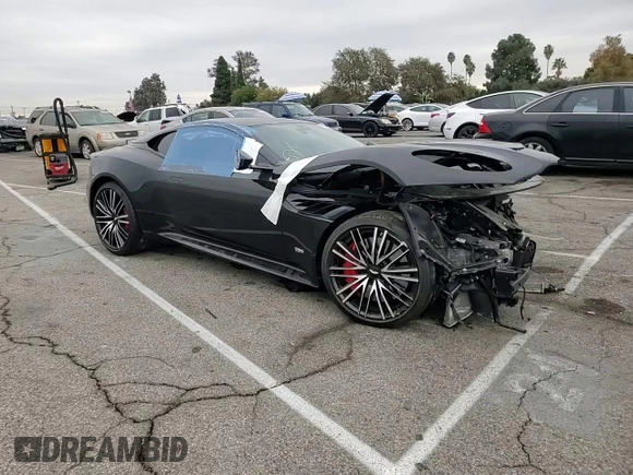 2020 Aston Martin DBS Superleggera z VIN SCFRMHAV7LGR02212, wystawiony jako Copart lot #74386264 z przebiegiem Nie podano mil oraz Szkody całkowita. Historia ofert i sprzedaży dostępna na DreamBid. Obrazek 11.