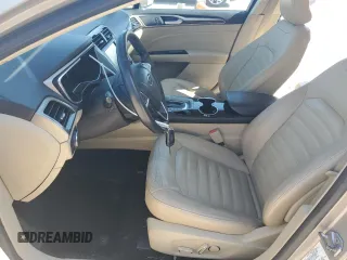 2015 Ford Fusion SE z VIN 3FA6P0HD7FR176586, wystawiony jako Copart lot #57523525 z przebiegiem 126 950 mil mil oraz Szkoda całkowita • Salvage title. Historia ofert i sprzedaży dostępna na DreamBid. Obrazek 7.