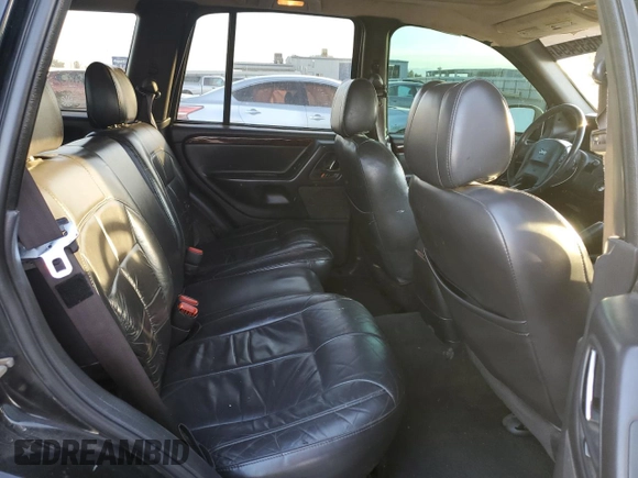 2001 Jeep Grand Cherokee Limited with VIN 1J4GX58S01C652737, listed as a Copart auction lot 81635494 with 175,498 mi miles and Salvage Title. Bid and sale history available at DreamBid. Image 12.