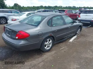 2003 Ford Taurus SE Standard with VIN 1FAFP53U43A233028, listed as a IAAI auction lot 42624211 with 65,364 mi miles and . Bid and sale history available at DreamBid. Image 4.