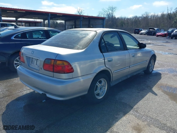 1999 Honda Civic VP with VIN 2HGEJ6615XH528453, listed as a IAAI auction lot 41655363 with 163,816 mi miles. Bid and sale history available at carsss.com. Image 4.