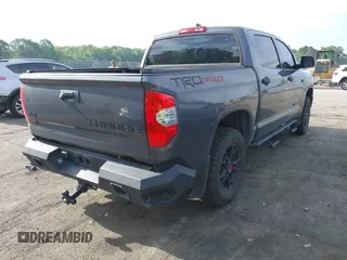 2021 Toyota Tundra SR5 with VIN 5TFDY5F19MX004939, listed as a IAAI auction lot 42197440 with 94,299 mi miles and . Bid and sale history available at DreamBid. Image 4.