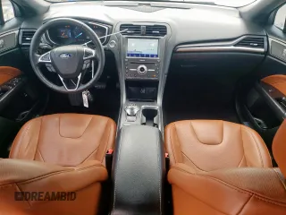 2019 Ford Fusion Titanium with VIN 3FA6P0SU7KR208701, listed as a Copart auction lot 54910895 with 114,991 mi miles and Salvage title. Bid and sale history available at DreamBid. Image 8.