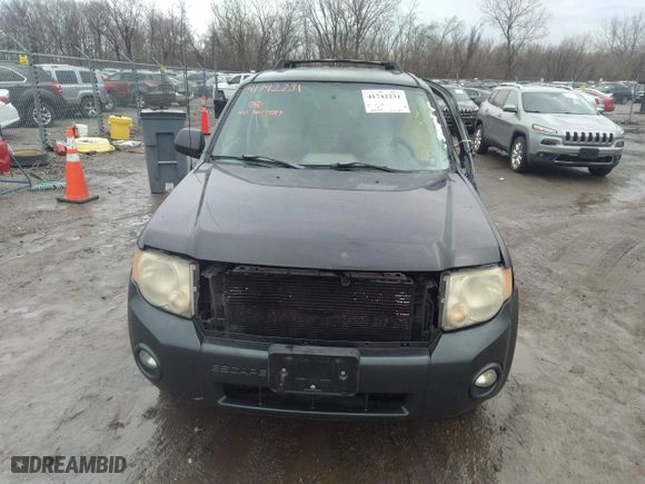 2008 Ford Escape XLT with VIN 1FMCU03148KC05614, listed as a IAAI auction lot 41742231 with 264,599 mi miles. Bid and sale history available at carsss.com. Image 12.