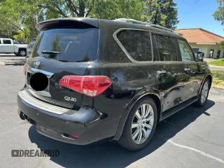 2014 Infiniti QX80 z VIN JN8AZ2NE6E9062908, wystawiony jako Copart lot #61263115 z przebiegiem 155 836 mil mil oraz Czysty tytuł • Clean title. Historia ofert i sprzedaży dostępna na DreamBid. Obrazek 4.
