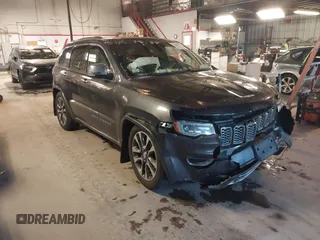 2018 Jeep Grand Cherokee High Altitude with VIN 1C4RJFCG3JC506731, listed as a IAAI auction lot 41269238 with 74,791 mi miles. Bid and sale history available at carsss.com. Image 1.