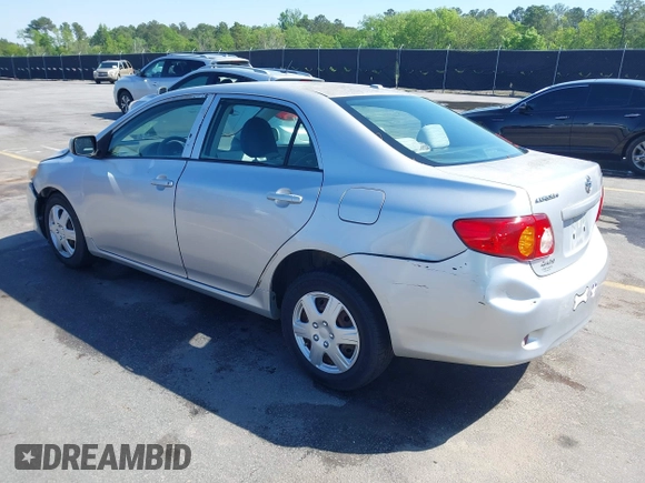 2009 Toyota Corolla with VIN 1NXBU40E99Z100681, listed as a IAAI auction lot 41973116 with 119,744 mi miles. Bid and sale history available at carsss.com. Image 3.