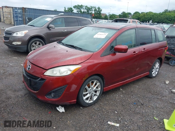 2012 Mazda 5 Grand Touring with VIN JM1CW2DLXC0134997, listed as a IAAI auction lot 42360574 with 230,951 mi miles and . Bid and sale history available at DreamBid. Image 2.