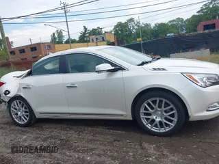 2014 Buick LaCrosse Premium I with VIN 1G4GD5G36EF226642, listed as a IAAI auction lot 42611309 with 137,206 mi miles and . Bid and sale history available at DreamBid. Image 14.