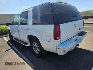 2000 Cadillac Escalade z VIN 1GYEK63R3YR218285, wystawiony jako Copart lot #82063084 z przebiegiem 190 444 mil mil oraz Tytuł czysty. Historia ofert i sprzedaży dostępna na DreamBid. Obrazek 3.