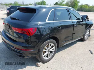 2021 Audi Q3 S line Premium Plus with VIN WA1EECF31M1068473, listed as a IAAI auction lot 42431540 with 42,312 mi miles and . Bid and sale history available at DreamBid. Image 4.